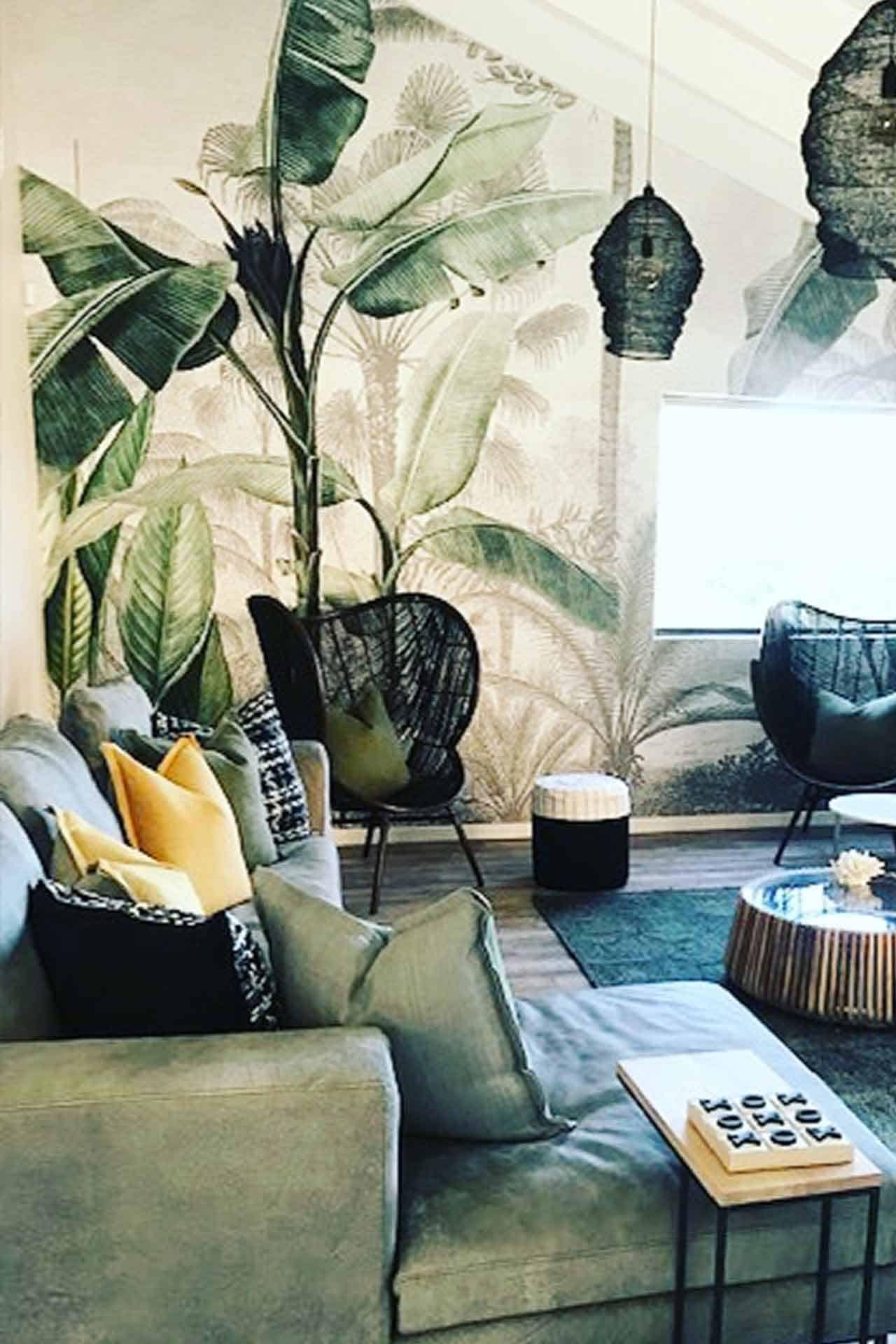 Tropical leaf mural featuring lush green leaves, vibrant yellow highlights, and subtle tropical colors. Perfect for adding a fresh, natural touch to any space.