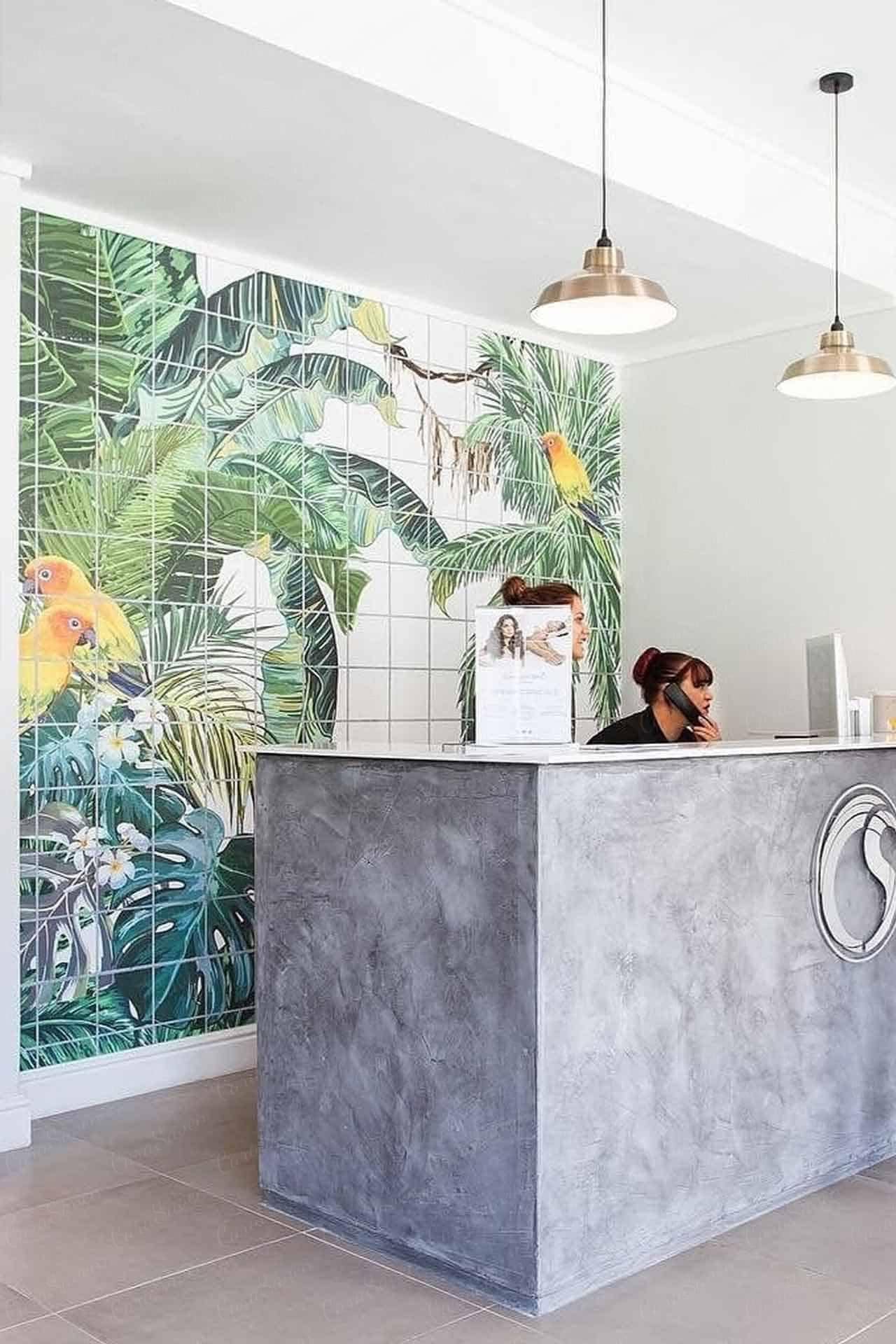 Vibrant, tropical-themed mural featuring lush green foliage and diverse birds. Rich shades of green, pops of vivid blues, striking reds, and radiant yellows dominate the design. Elements include exotic plants with broad leaves and detailed bird species like parrots and toucans adding dynamic splashes of color against a verdant backdrop.