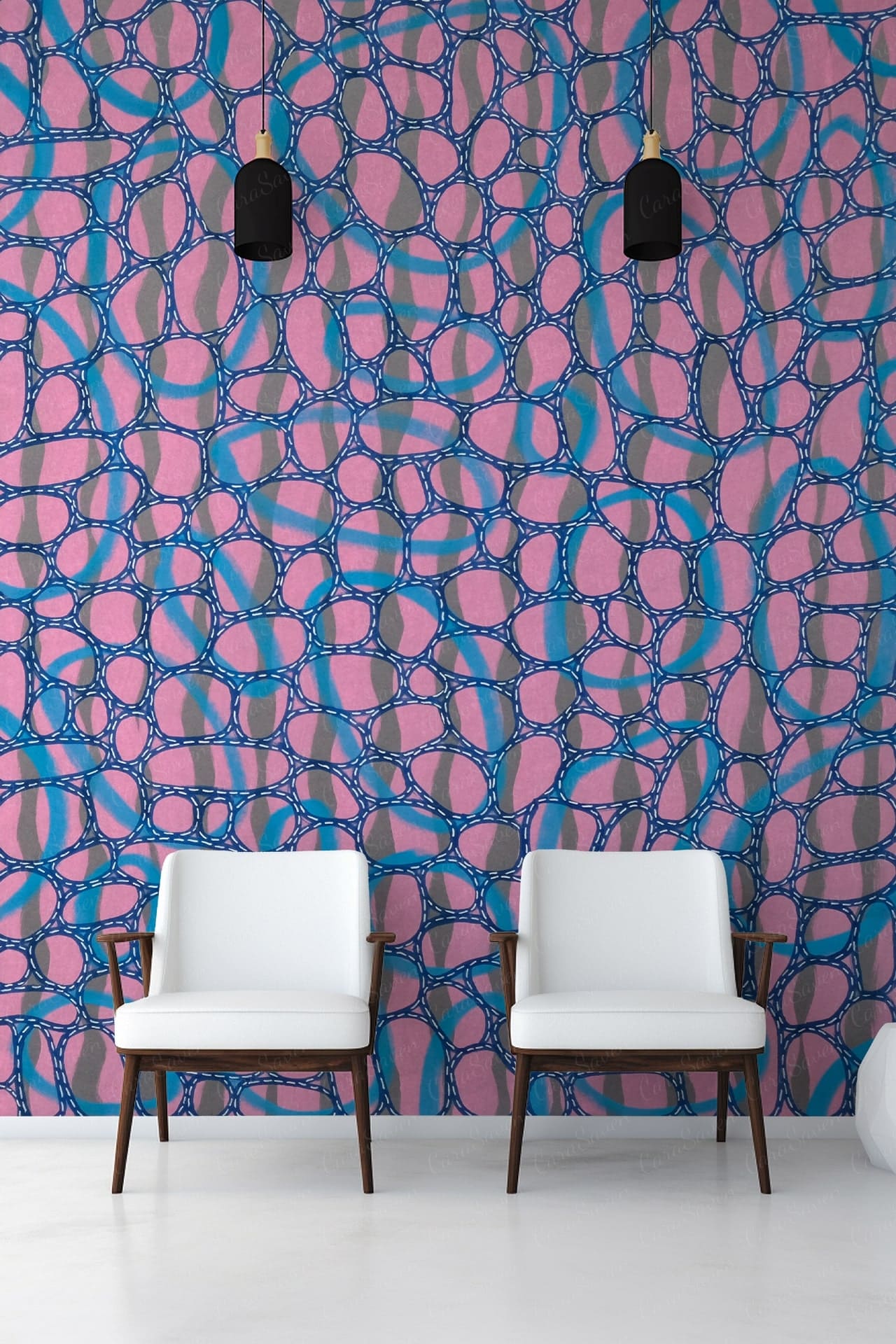 The wallpaper showcases a modern, abstract pattern with bold pink and blue colors. It features fluid shapes and dynamic designs, incorporating both sharp angles and smooth curves. The colors are vibrant, making the wall a focal point in the room. Key elements include interlocking geometric forms and splashes of pastel shades.