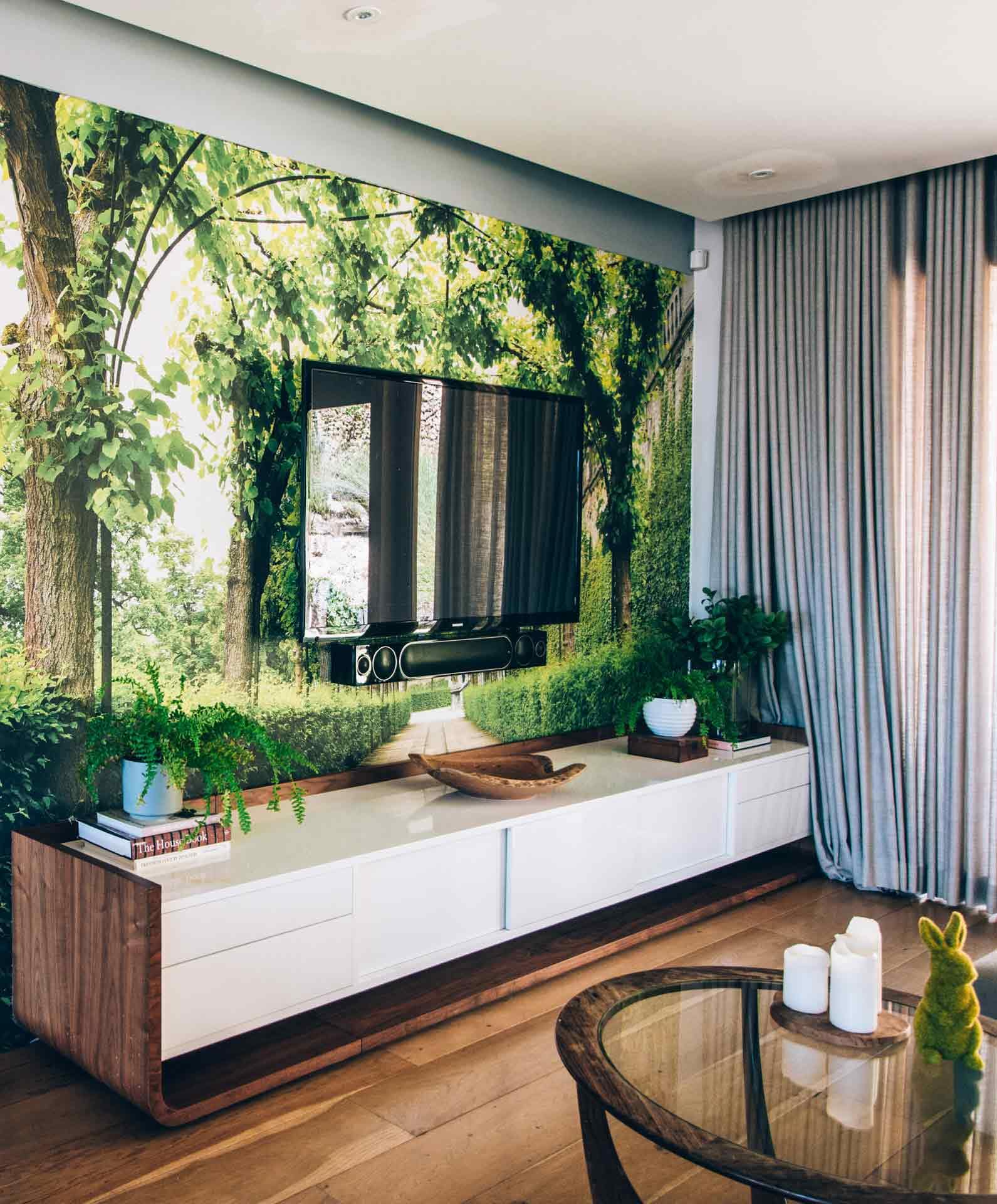 Nature-themed wall mural, vibrant green trees, lush foliage, natural textures, shades of green, forest scene, earthy tones.