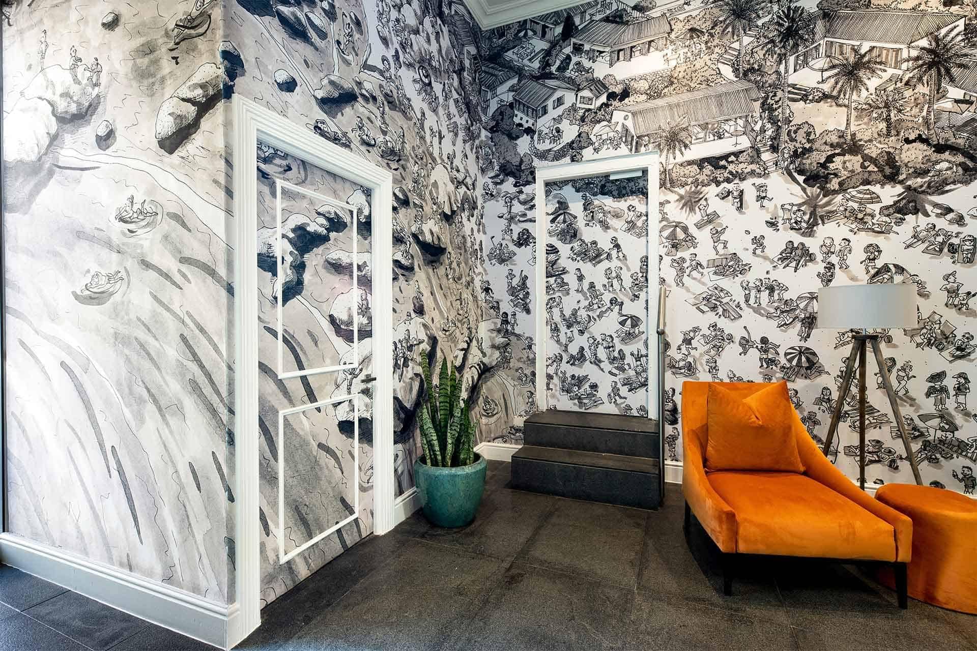 The wallpaper features black and white mural walls with intricate drawings.