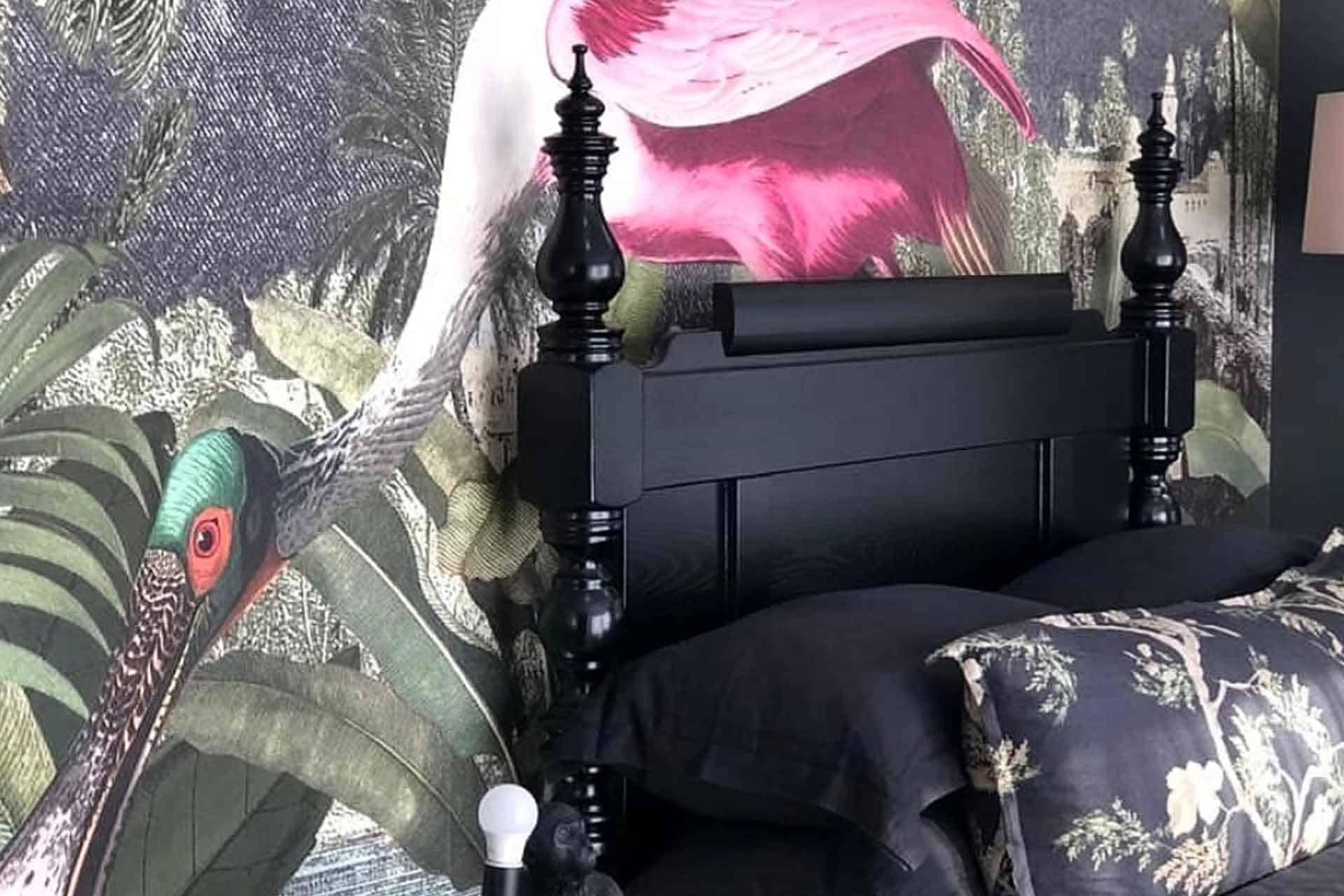 The wallpaper features large, detailed images of vibrant tropical birds and lush foliage. Expect vivid hues like emerald green, sunny yellow, deep red, and bright blue among the intricate patterns. Perfect for search terms like "colorful tropical wallpaper," "vivid bird and foliage design," or "detailed exotic nature mural.