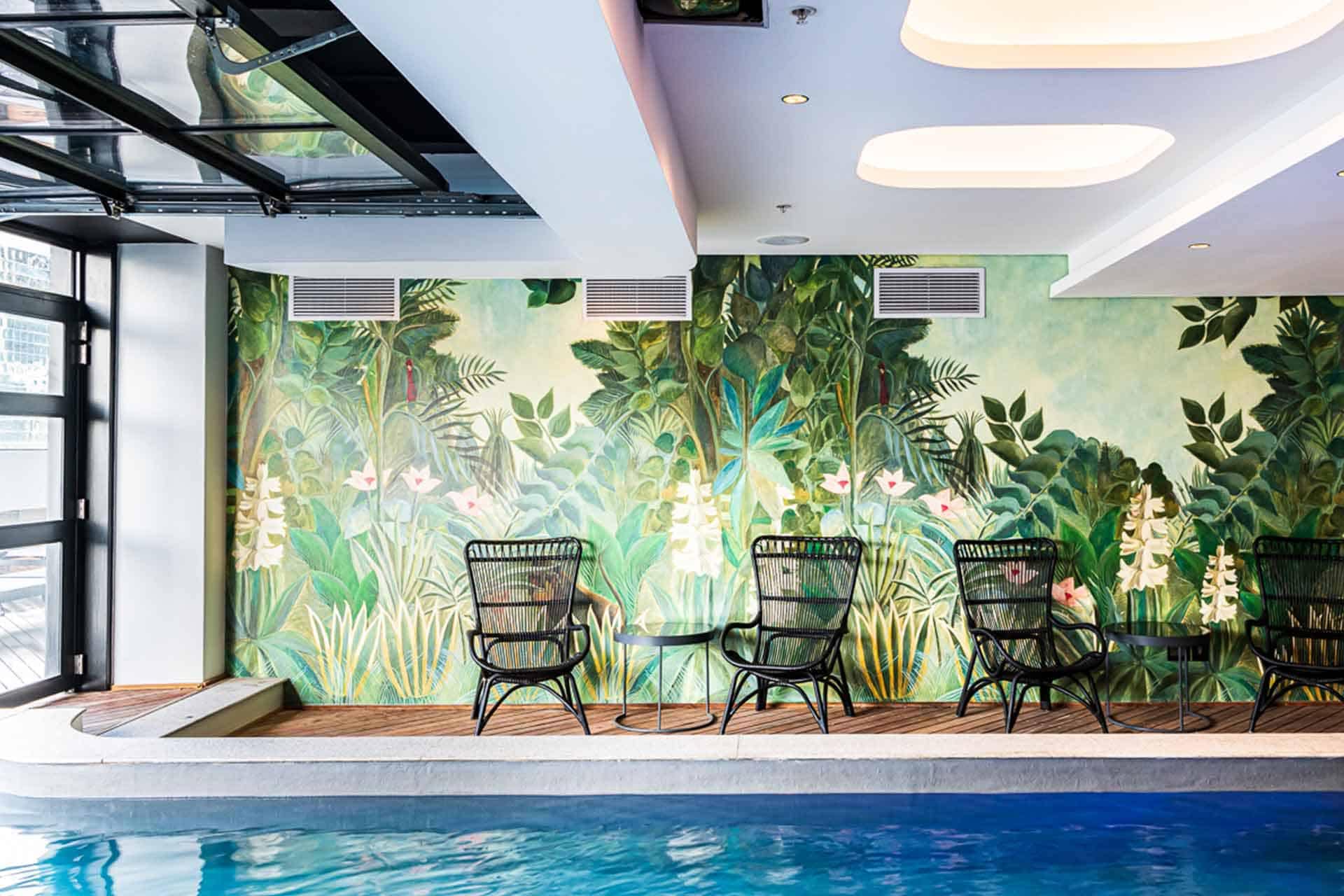 Lush green foliage, pink flowers, intricate leaves, vibrant colors, botanical theme, jungle-inspired pattern.