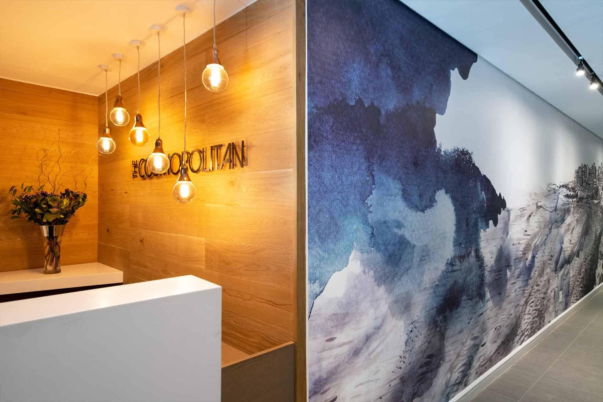 Abstract mural in shades of blue and gray, artistic touch.