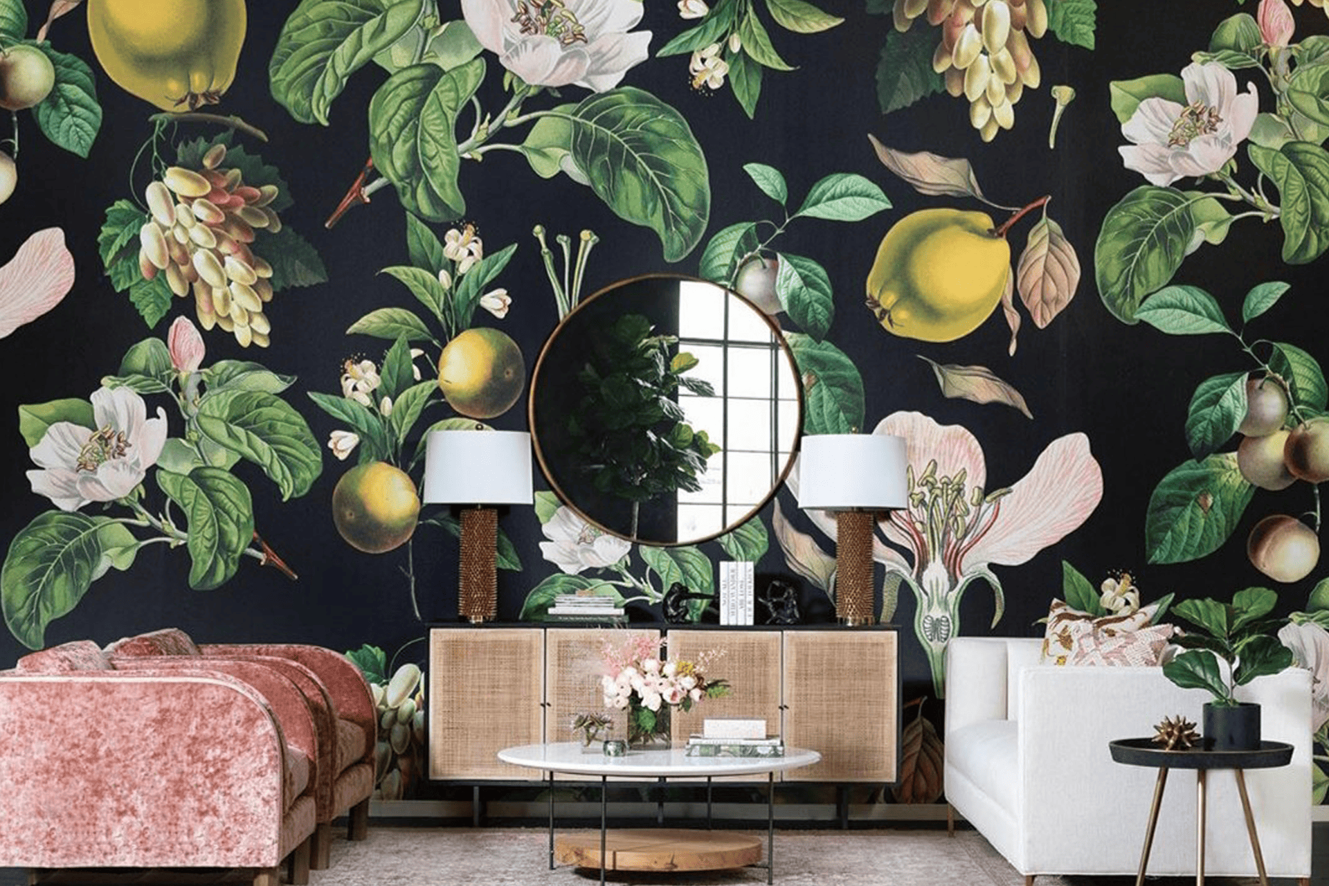 Dark floral wallpaper with large green leaves, white flowers, and yellow fruits.