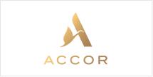 The wallpaper features a stylized gold letter "A" with a feather-like design, the word "ACCOR" in gold, and is set against a transparent background.