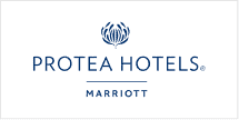 The wallpaper of the Protea Hotels by Marriott logo features a sophisticated blue stylized protea flower above bold blue text, "Protea Hotels" and "Marriott," exuding elegance and style.