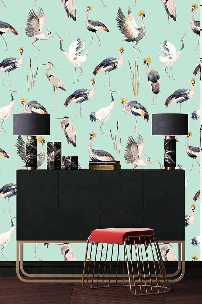 The wallpaper is light green with bird-themed designs featuring various cranes.