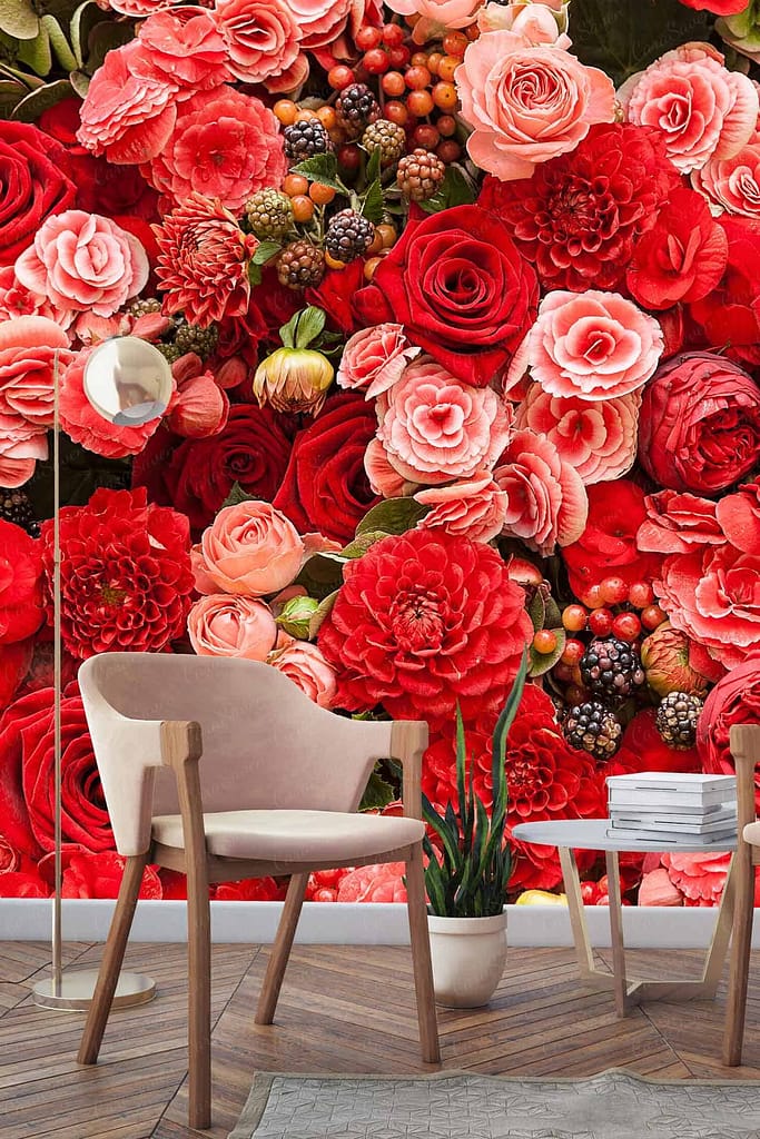 Vibrant bursting berries floral wall with red and pink roses.