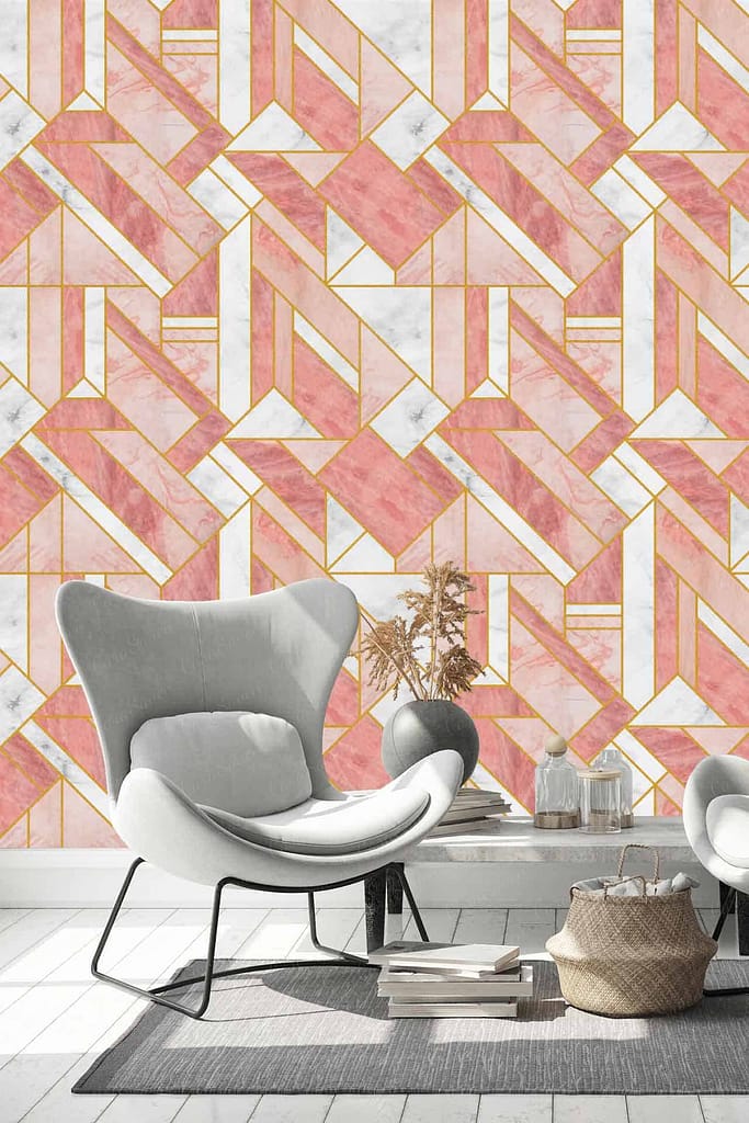 The wallpaper features a geometric pattern with pink and white hues, accented with gold highlights. The design is modern and adds a touch of elegance to the living space.