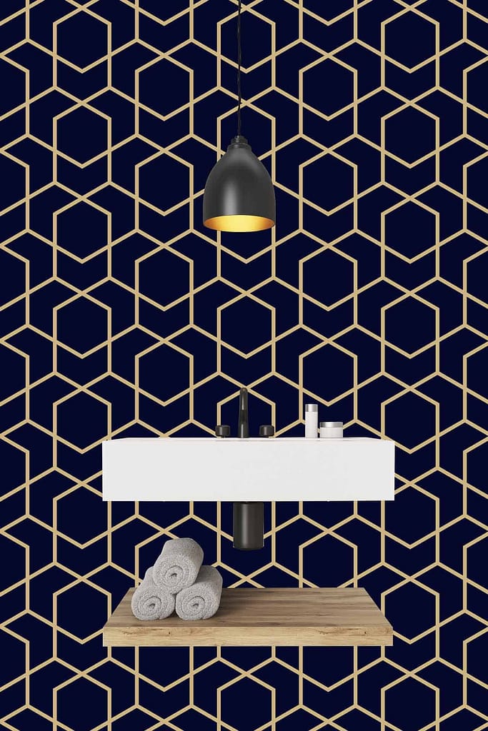 Contemporary bathroom features a striking geometric hexagon-patterned navy wallpaper, characterized by clean lines and sharp angles. The deep navy serves as the base color, complemented by subtle metallic accents within the hexagonal shapes for added depth and sophistication.