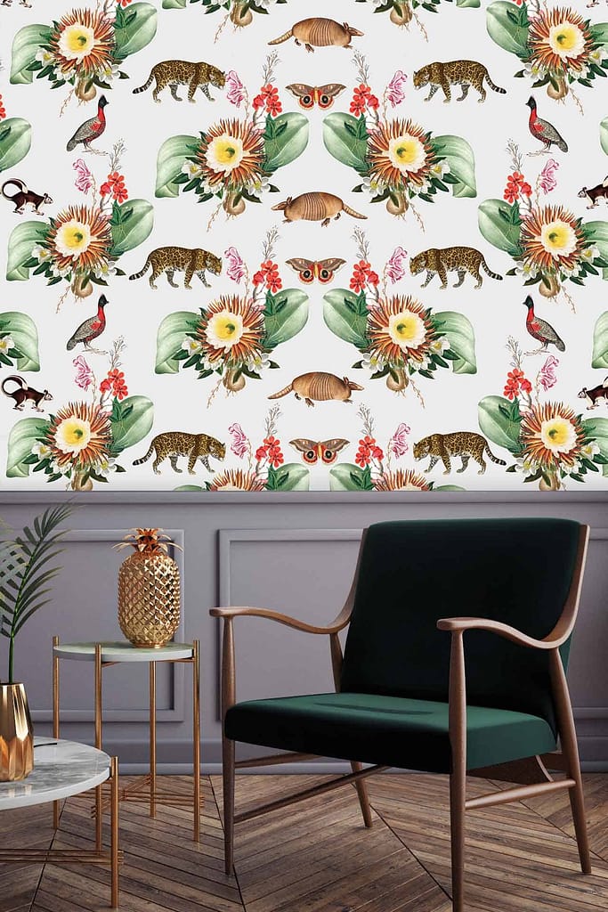 The wallpaper is a vibrant, repeating pattern showcasing tropical elements. It features leopards with golden spots, colorful birds in shades of blue and red, delicate butterflies in various hues, and lush green leaves. The palette includes deep greens, rich golds, and bold splashes of red and blue for an exotic feel.