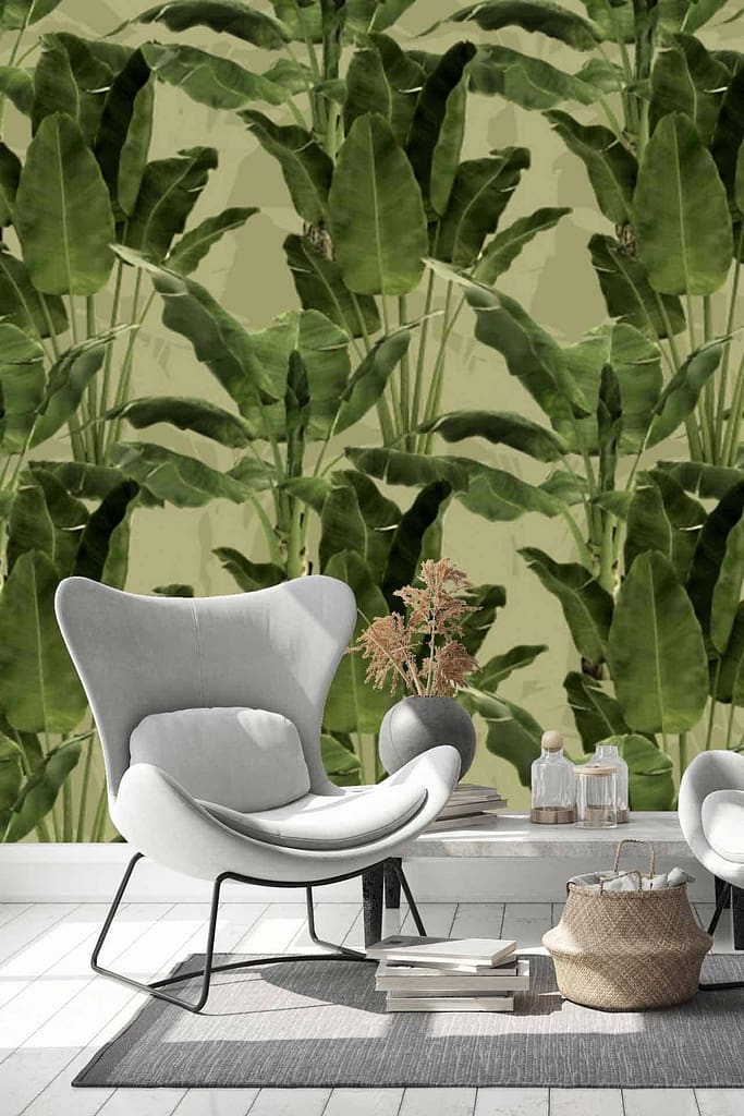 The wallpaper is adorned with large, leafy green banana leaves, creating a lush, tropical ambiance. The elements feature vibrant shades of green and intricate details of the banana leaves themselves.