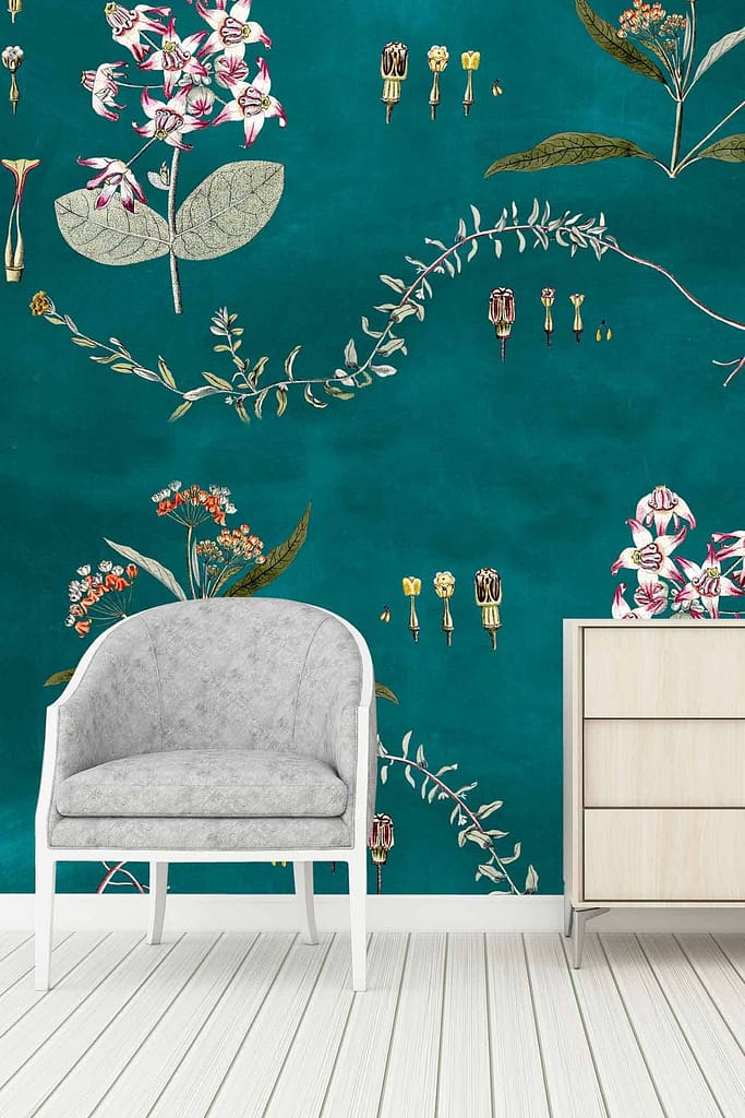 The wallpaper features a teal background with floral patterns in white, pink, and green. Various flowers and leaves are depicted, creating a vibrant and artistic atmosphere.