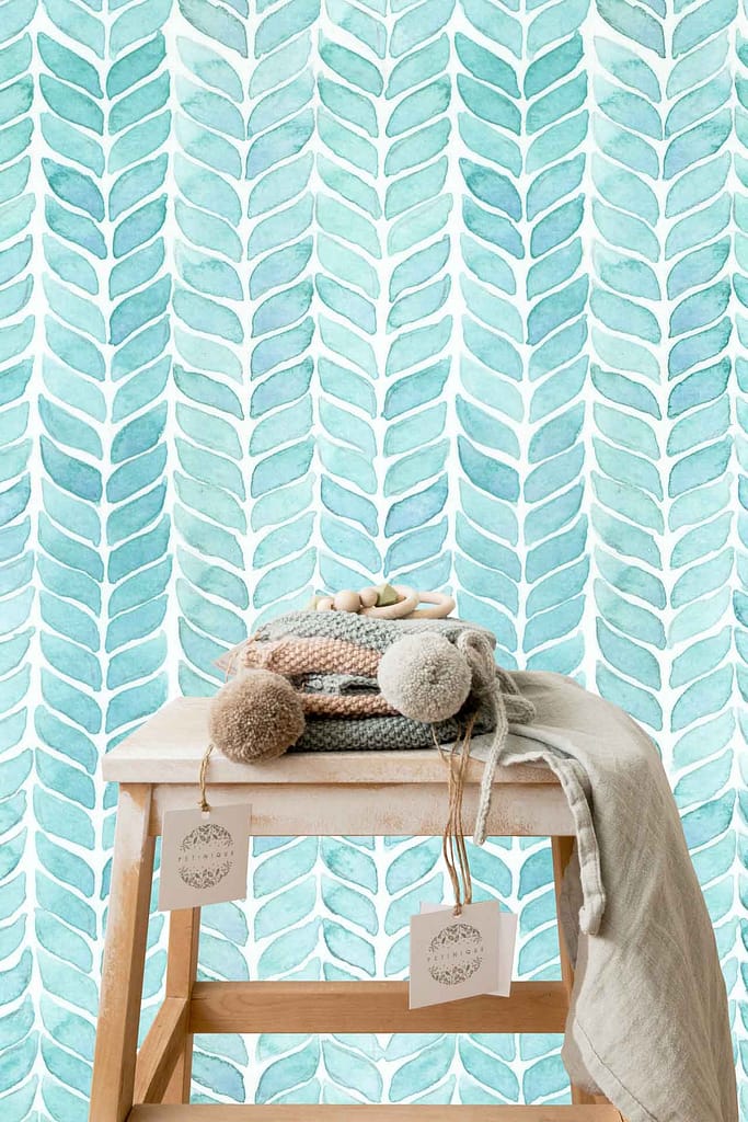 Teal and white leaf-patterned wallpaper.