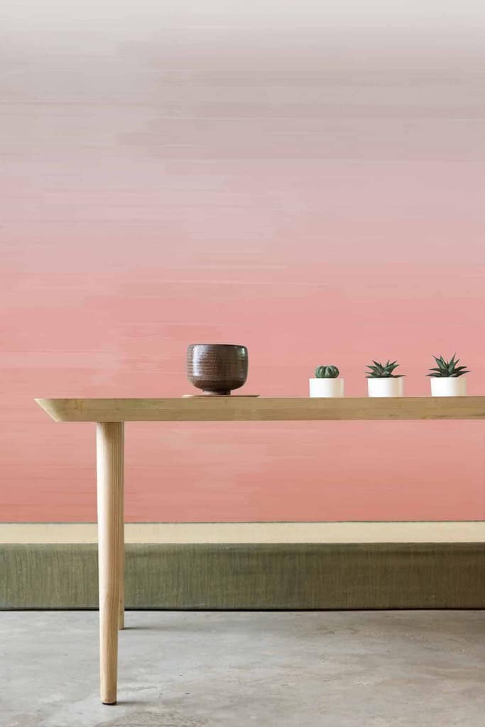 The wallpaper features a gradient of soft pinks and off-whites, creating a serene and elegant atmosphere.