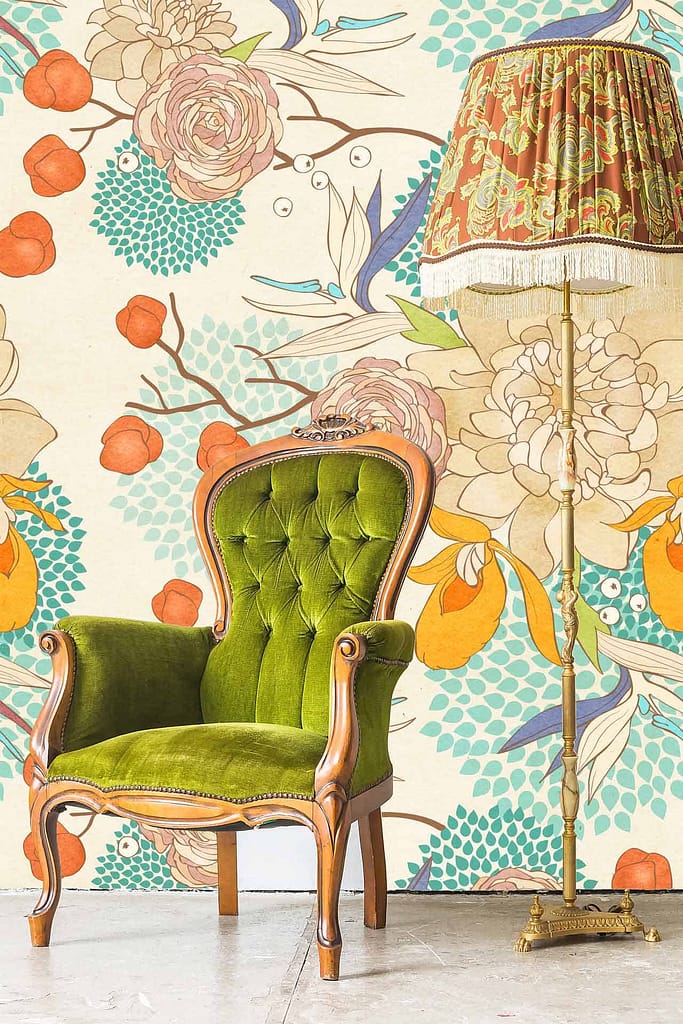 Vibrant floral and fruit wallpaper with large blooms in shades of orange, yellow, and blue, interspersed with cherries.