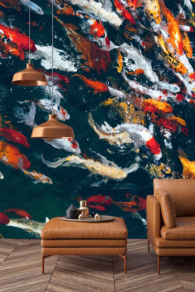 The "Koi Commute" wall mural features colorful koi fish in shades of orange, gold, white, and black swimming gracefully through a serene blue pond with hints of green lily pads. The vivid scene is accentuated by delicate brushstrokes and subtle gradients, making the wallpaper a captivating focal point.