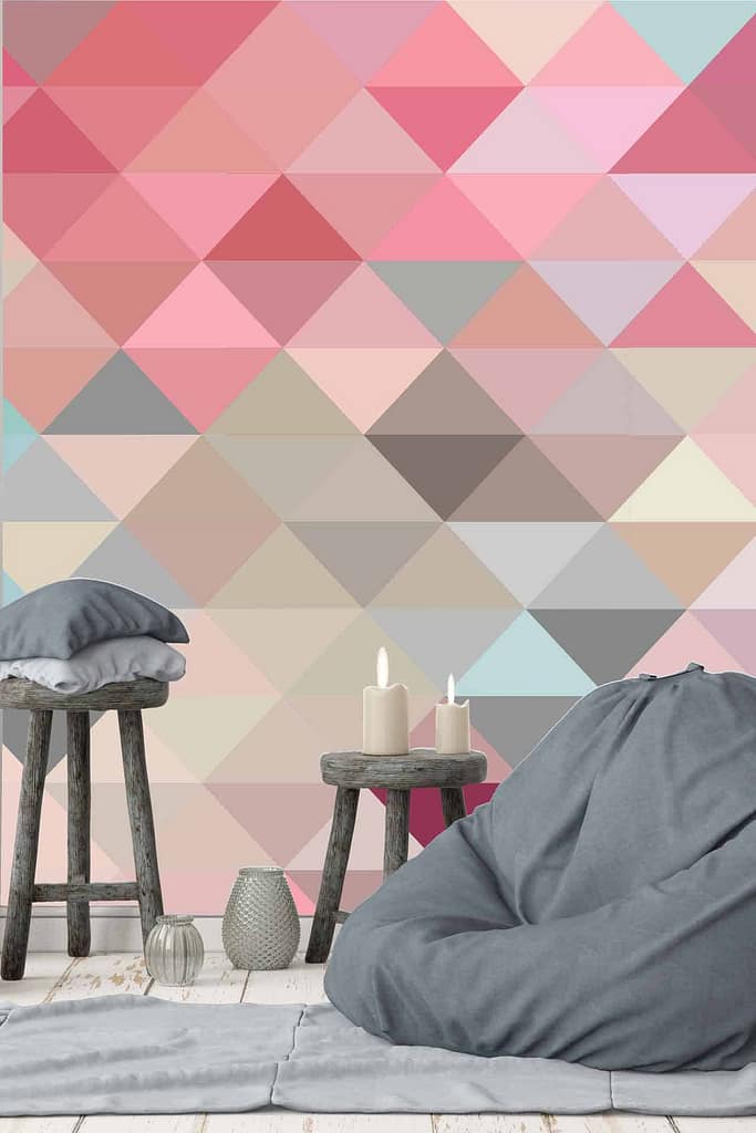 Vibrant geometric wallpaper with pink, peach, red, and gray triangles.