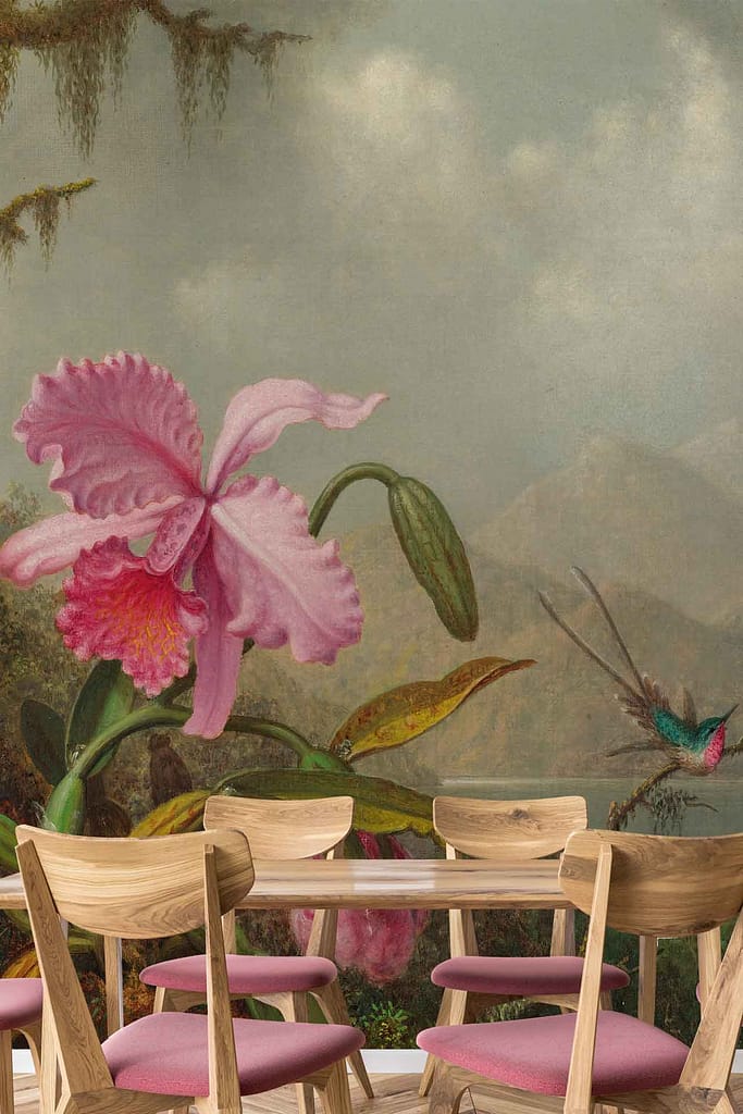 The wallpaper features a large pink orchid, lush green leaves, mountainous terrain, and a hummingbird mid-flight. The colors include vibrant pinks and greens, reminiscent of the natural beauty of Martinique.