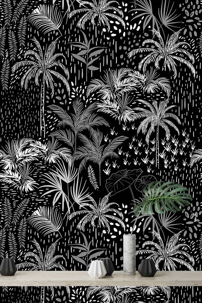 A black and white tropical-themed wallpaper features various palm leaves and abstract plant designs, offering soothing, detailed botanical patterns in monochrome hues.