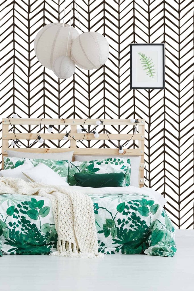 Black and white chevron pattern. Framed picture of a fern.