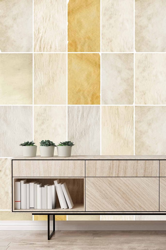 The wallpaper features an abstract, textured mural in shades of beige and yellow. Key elements include varying tones and artistic splashes that create a modern, minimalist design.