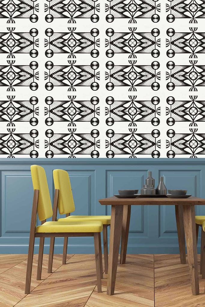 Intricate black and white geometric wallpaper above blue wainscoting, reminiscent of screen print designs. The wallpaper features complex patterns with sharp lines and bold contrasts in black and white.