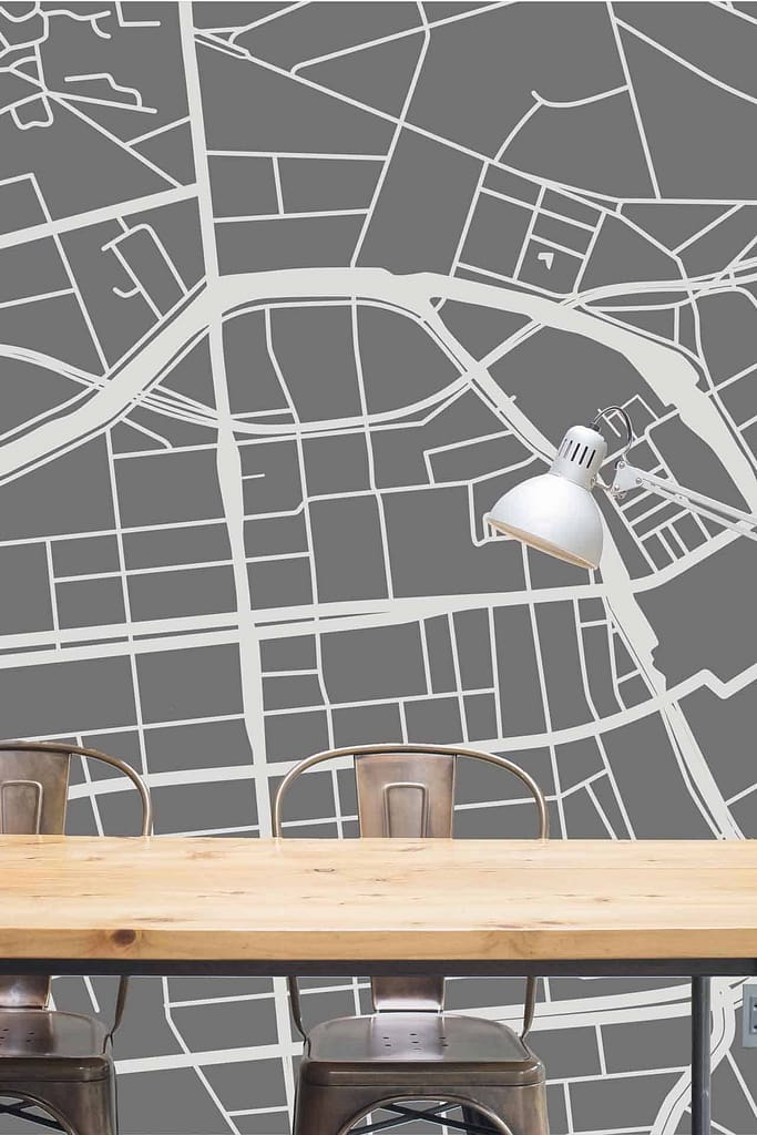 The wallpaper features a large grayscale map, providing a sense of direction. This monochrome design blends urban and minimalist styles, with detailed cartographic elements in shades of black, white, and gray.