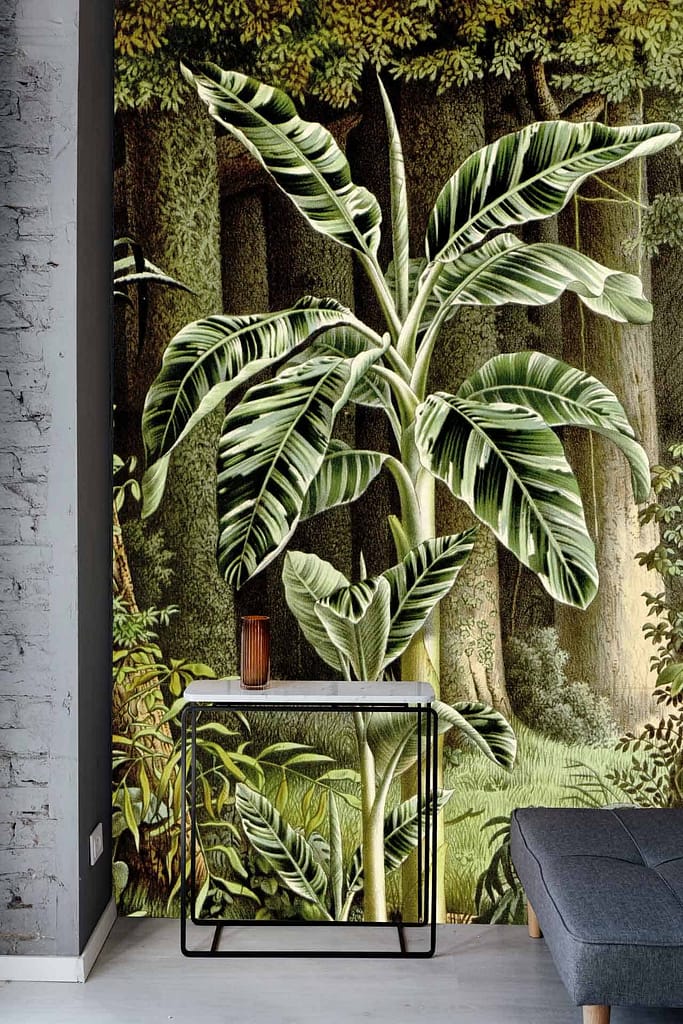A detailed mural of tropical banana trees and a dense forest features prominently. Elements include large banana leaves, tree trunks, and lush greenery. The colors comprise various shades of green, brown, and hints of bright foliage.