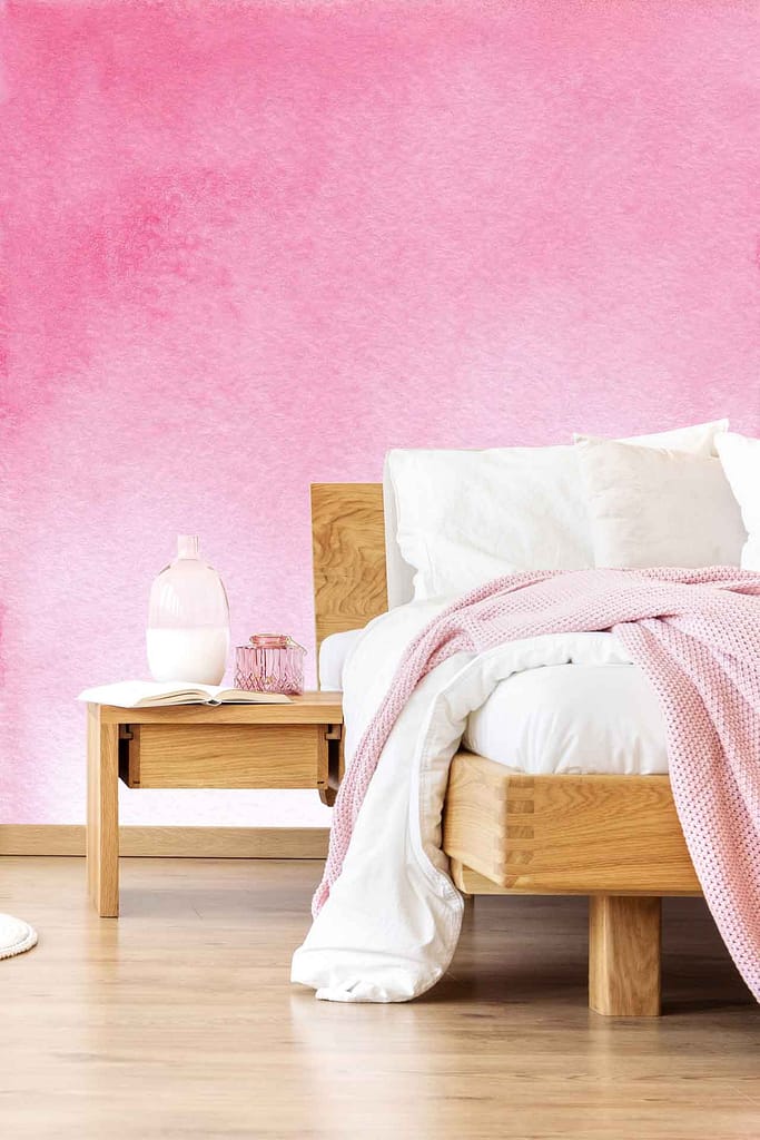 Gradient pink watercolor wall, reminiscent of an evening sunset.