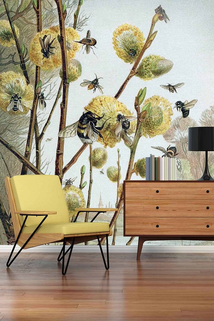 The wallpaper showcases vibrant honey bees collecting nectar from fluffy yellow flowers, creating a dynamic scene reminiscent of air travel exploration. Elements include bees in various flight positions, detailed yellow flowers, and the overall theme of nature's busyness. Colors primarily feature bright yellows, contrasting with dark bee stripes and occasional greens for leaves.