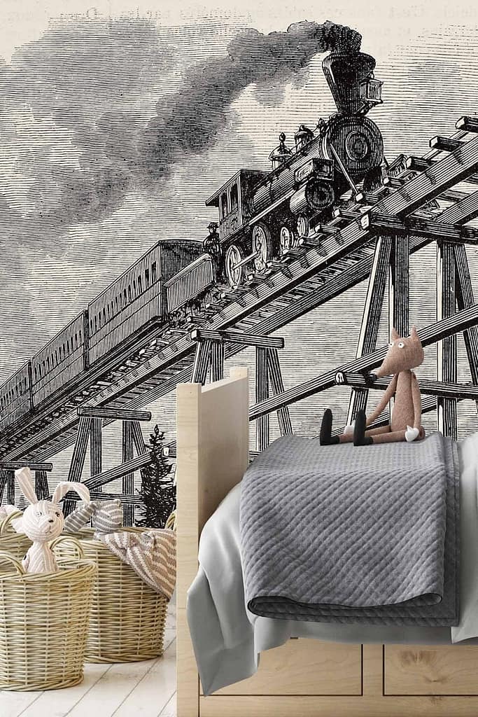 The wallpaper showcases a charming illustrated vintage steam locomotive crossing a truss bridge, reminiscent of Thomas adventures. The train is detailed with vibrant shades of blue, red, and yellow against a soft cream background. Small puffs of gray smoke add an extra nostalgic touch.