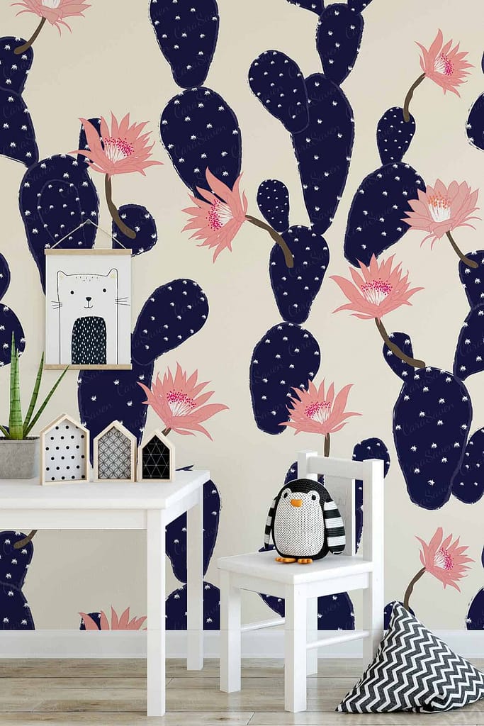 Whimsical cactus-themed wallpaper featuring dark blue cacti with tickled pink flowers.