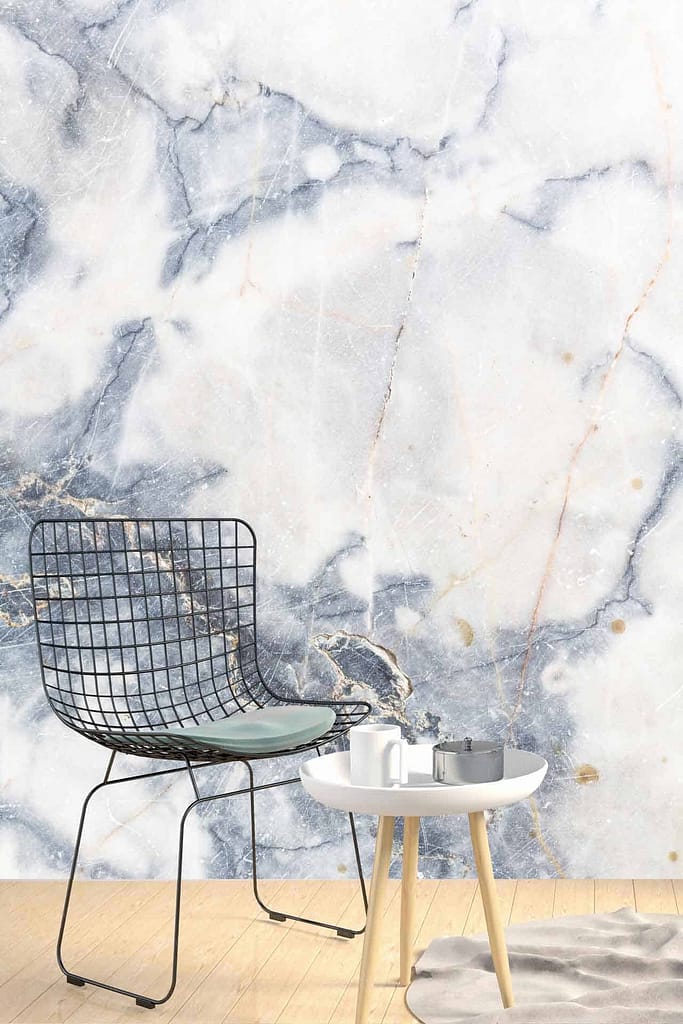 The wallpaper features a light gray and white marbled pattern.