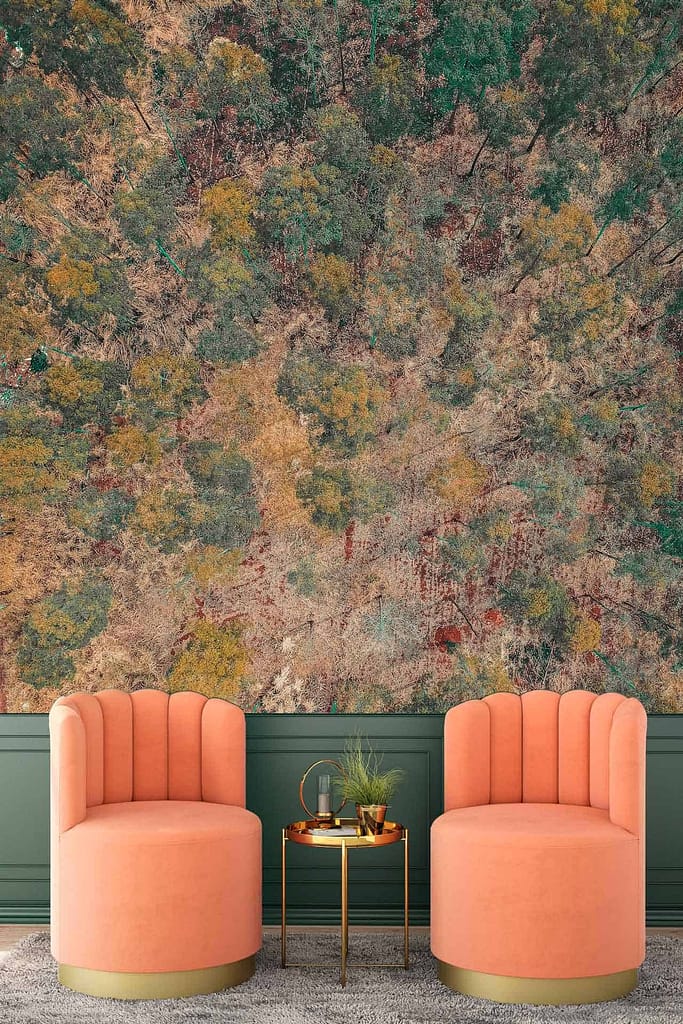The wallpaper is a large, colorful mural of a forested landscape featuring green, yellow, and brown hues. It exudes a sense of trading places with nature in this cozy setting.