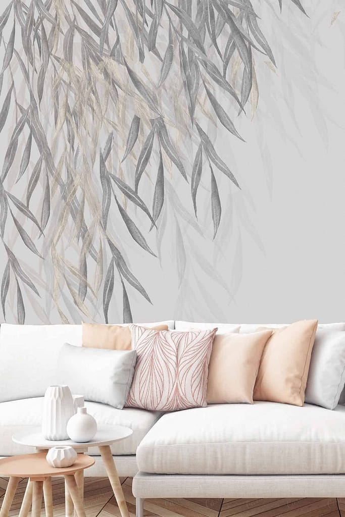 The wallpaper is a soft gray leafy mural, featuring subtle leaf patterns in various shades of gray. The delicate design creates a serene and airy ambiance, perfect for minimalist décor. Key elements include soft hues, leaves, and a muted gray palette.
