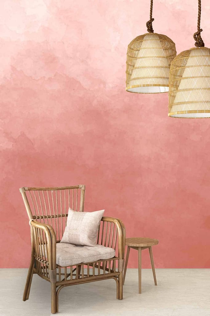 The wallpaper is a pink textured design, creating a soft and serene backdrop. The subtle texture provides depth and warmth to the space, complementing the minimalist aesthetic.