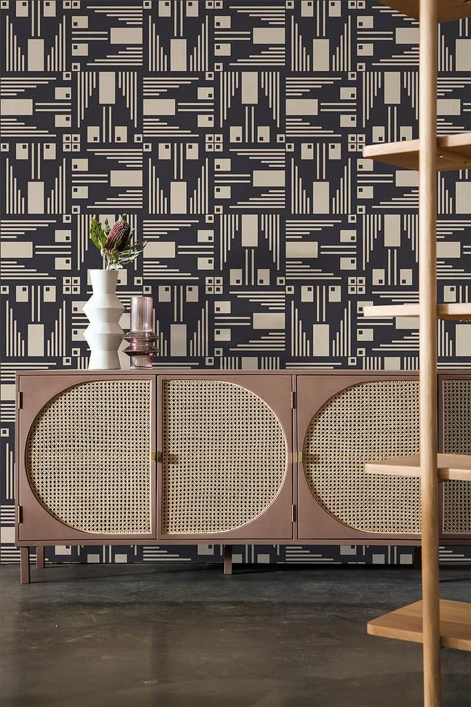 Geometric, modern black and beige wallpaper with tortoise shell patterns.