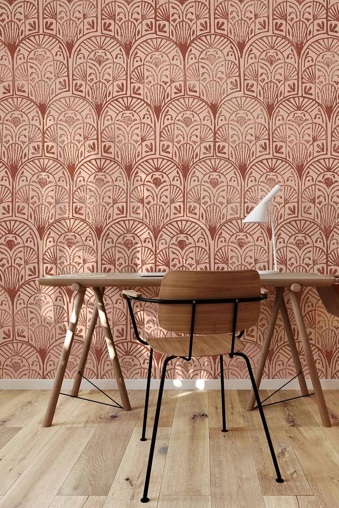 Earthy red and beige wallpaper with an intricate garden trellis design.