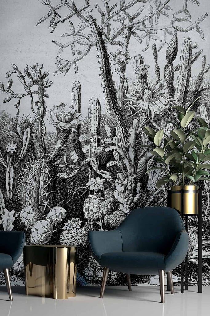 The wallpaper is a detailed black and white botanical mural featuring various cacti.