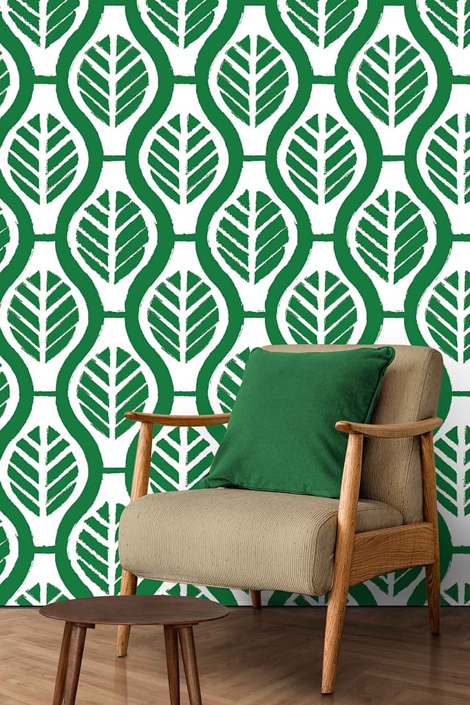 Green leaf pattern on white wall.