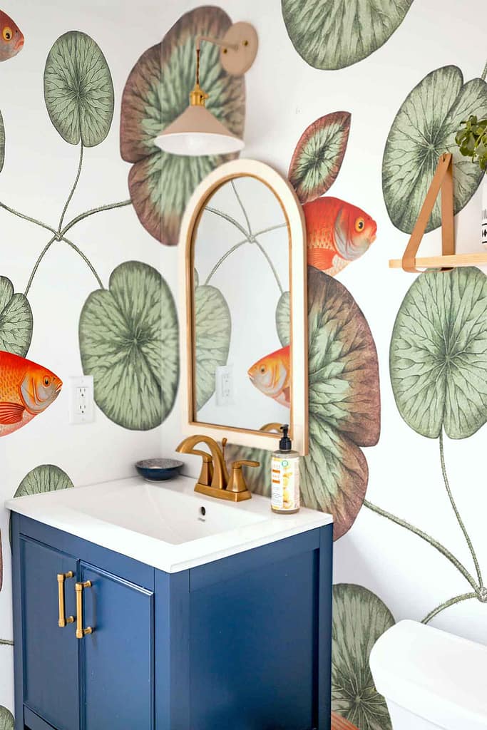 Green lily pad and goldfish wallpaper; lily pads, goldfish, green, gold, aquarium-like charm.
