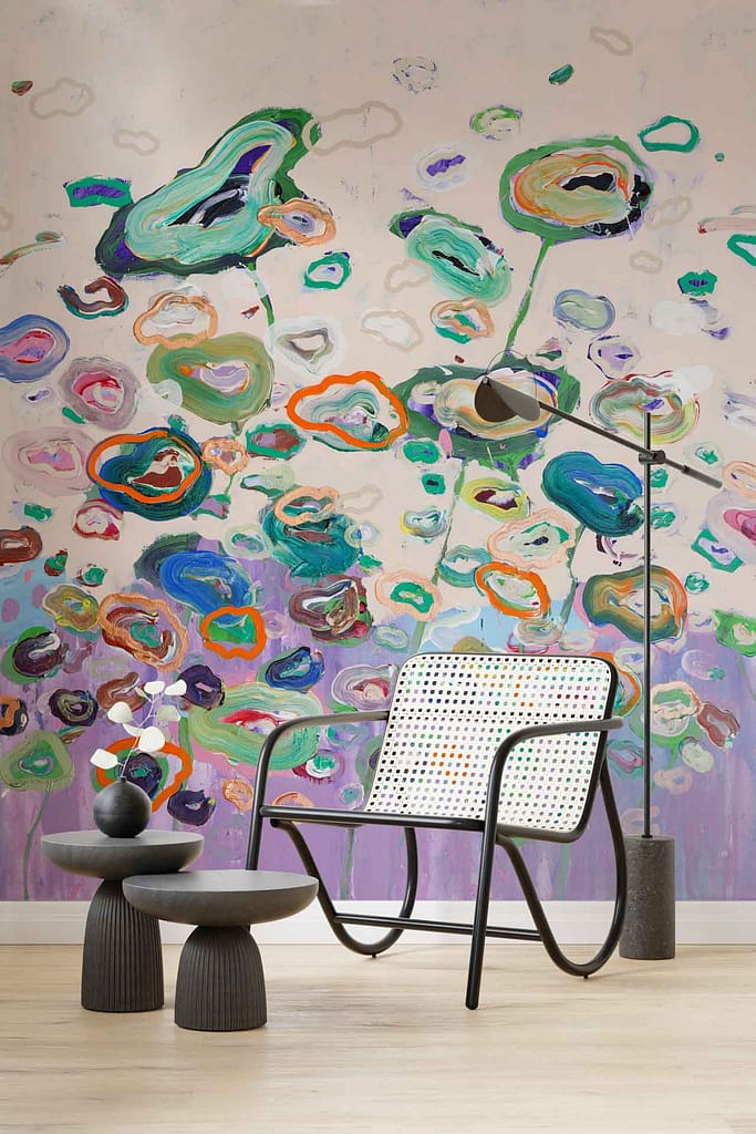 The Dance" mural features an abstract design with swirling patterns. Key colors include vibrant green, rich purple, deep blue, and bold orange. The artwork creates a dynamic, colorful backdrop with its energetic shapes and lively hues.