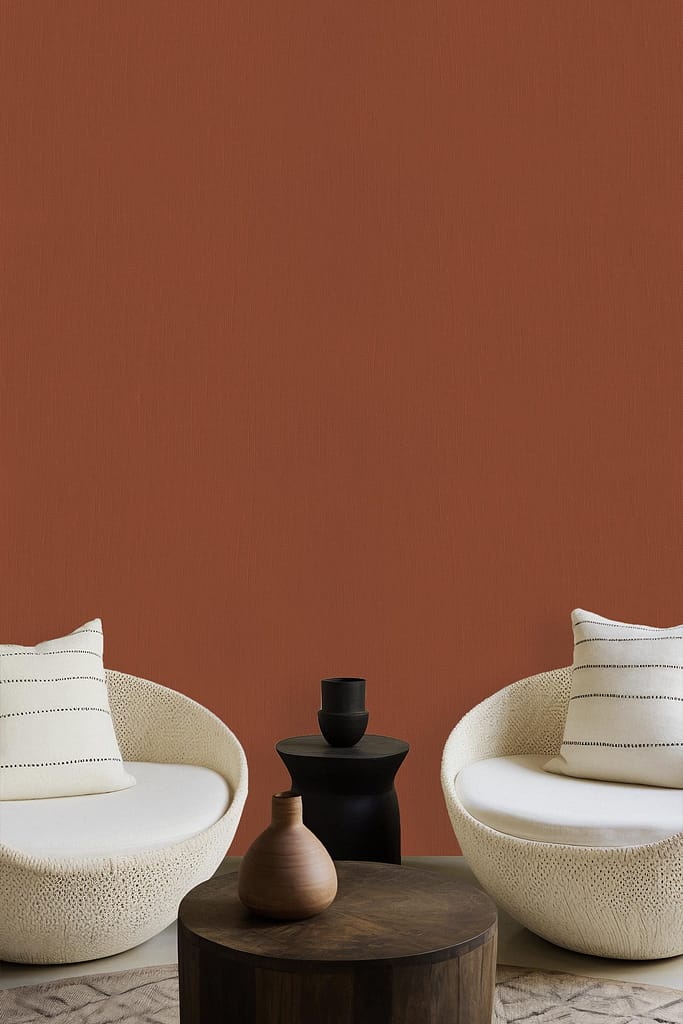 The wallpaper is burnt copper in color.