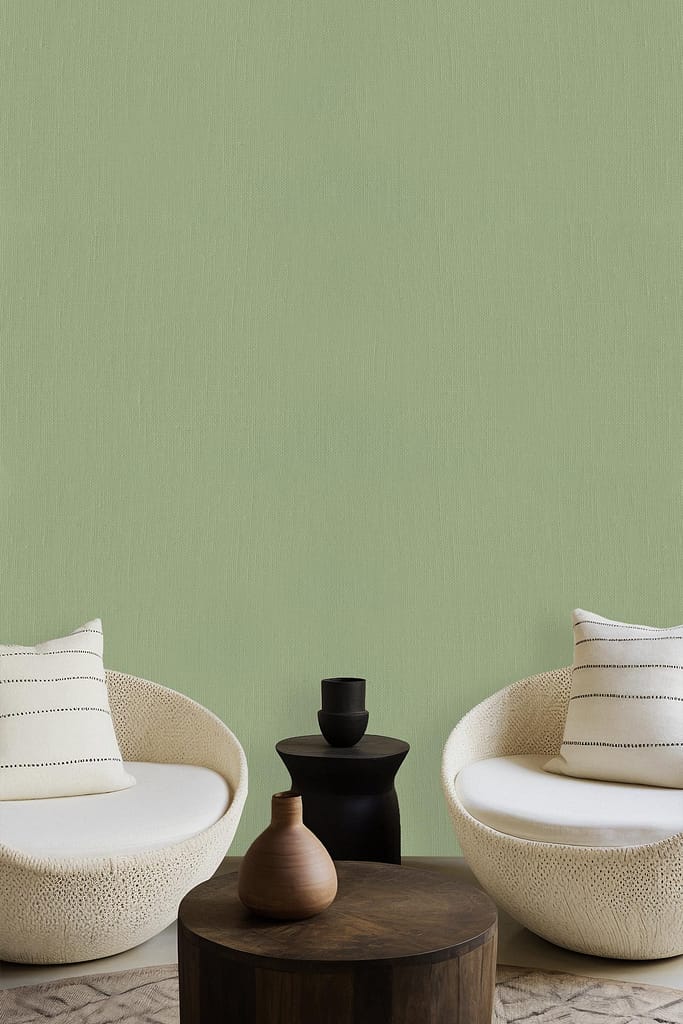 Muted green wallpaper reminiscent of a backyard putting green, calming and serene. Subtle texture adds depth and tranquility.