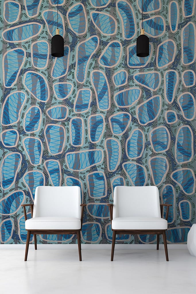 A modern living room wallpaper featuring textured, abstract patterns in blue, grey, and white.