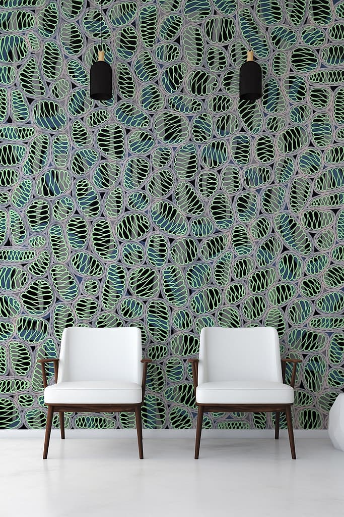 The wallpaper features a vibrant, abstract leaf pattern with shades of green and blue. Elements include large, overlapping leaves with gradient hues ranging from deep forest green to light teal and azure blue. The design is dynamic and fluid, lending a modern and lively atmosphere to the space.