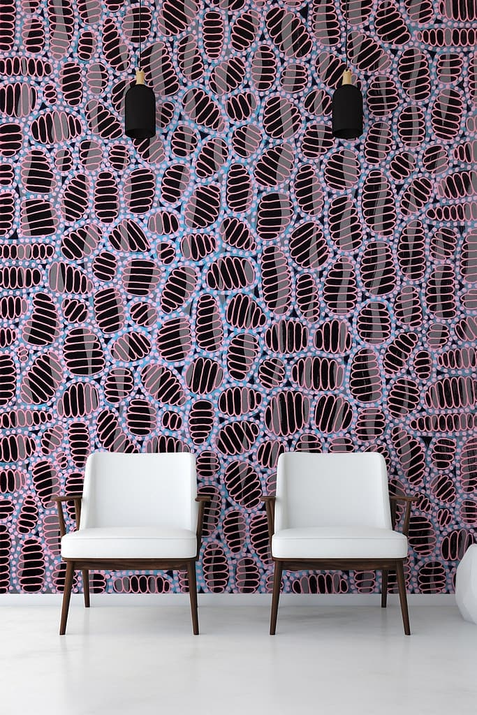 Abstract-patterned wallpaper with shapes in pink, blue, and black.