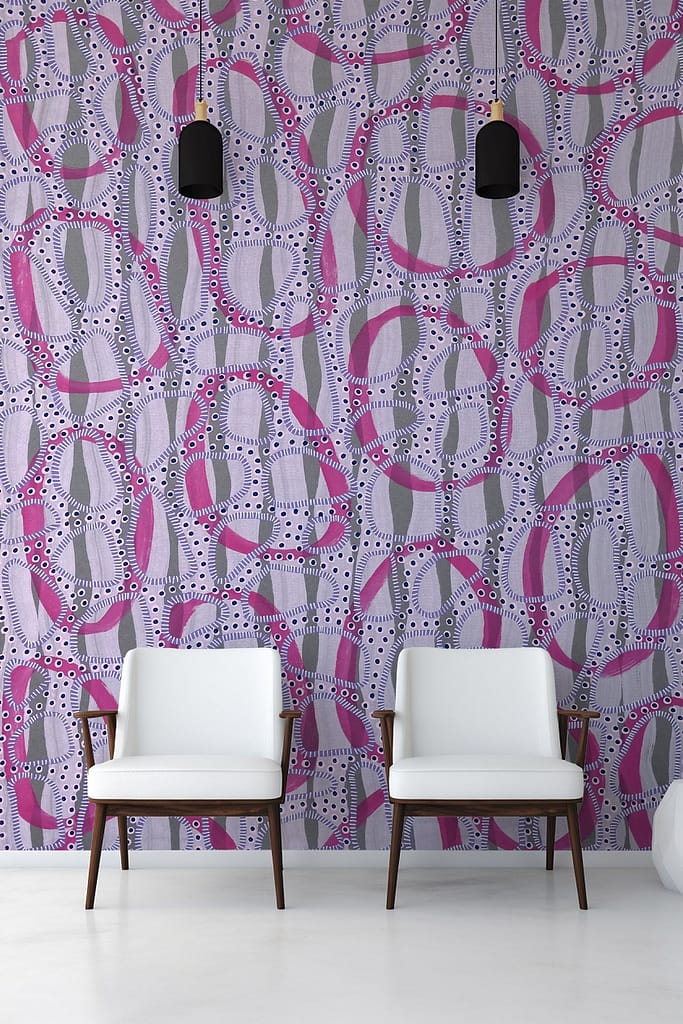 Vibrant abstract wall tapestry with interlocking geometric shapes in pink, gray, and black. Features dotted patterns.
